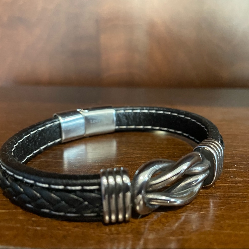 Young man’s brand new leather infinity bracelet. Never worn.  Size 9”.